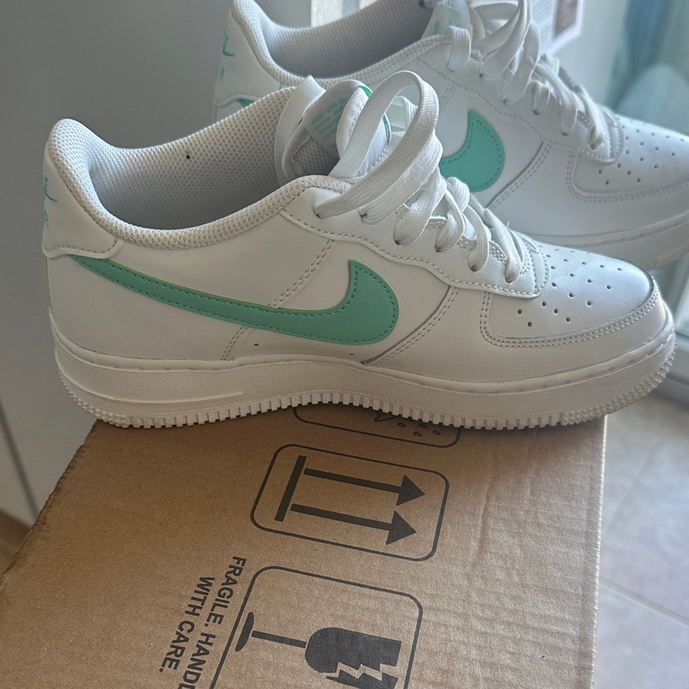 Nike Kids White Sneakers with Mint Green Swoosh